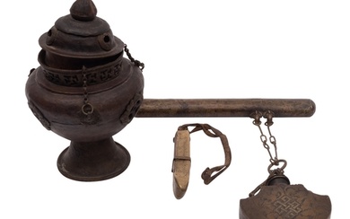 A Tibetan metal hanging incense burner with cover, a similar...