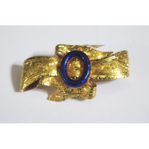 A Victorian High Carat Gold and Blue Enamel Bow Brooch with ...