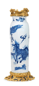 A blue and white 'Qilin and Phoenix' sleeve vase, Rolwagen