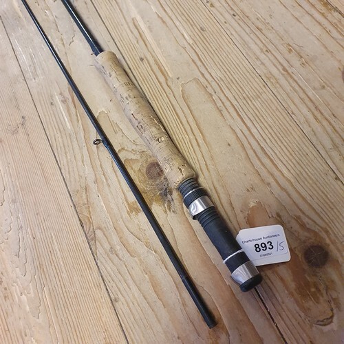 A carbon fibre fishing rod, and four other fishing rods, all...