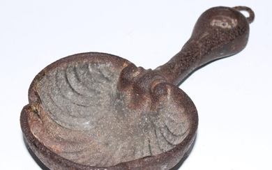 A cast iron water scoop, shell bowl, 21.5cm long