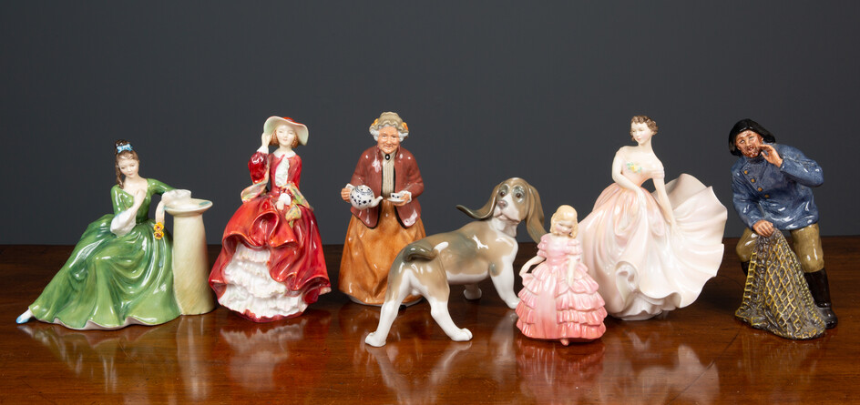 A collection of six Royal Doulton figures