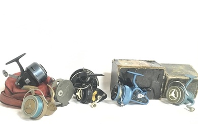 A collection of vintage fly fishing and spinning reels inclu...