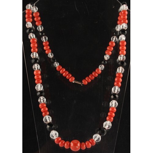 A coral jet & crystal bead necklace, the largest coral bead ...