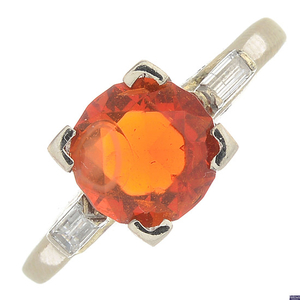 A diamond and fire opal ring.