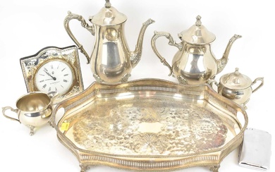 A five-piece silver plated tea set, comprising teapot, coffee pot,...