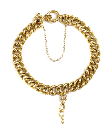 A gold curb link bracelet