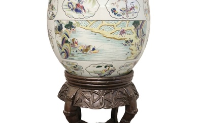 A huge pair of Chinese fish bowls with decorated panel scene...