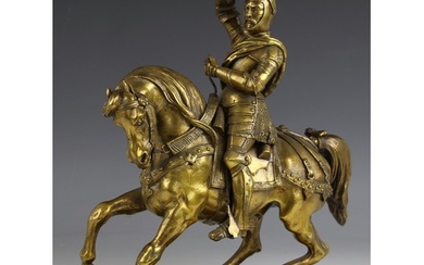 A lacquered bronze model of a knight on horseback, late 19th...