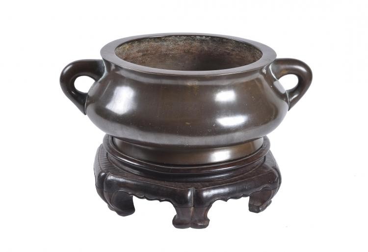 A large Chinese bronze bombe censer