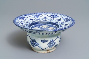 A large blue and white fritware spittoon or strain…