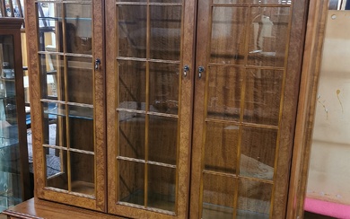 A mahogany and burr walnut veneered glass shelved display cabinet, 190 x 120 x 45cm.