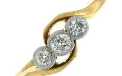 A mid 20th century 18ct gold old-cut diamond three-stone crossover ring.