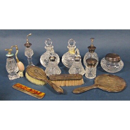 A mixed collection of silver dressing items to include a han...