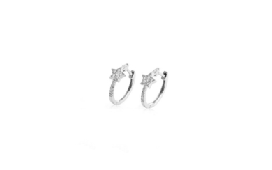 A pair of 18ct white gold (stamped 750) diamond set star shaped hoop earrings, L. 1.5cm.