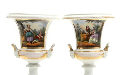 A pair of 19th century porcelain vases with handles, decorated in gold...