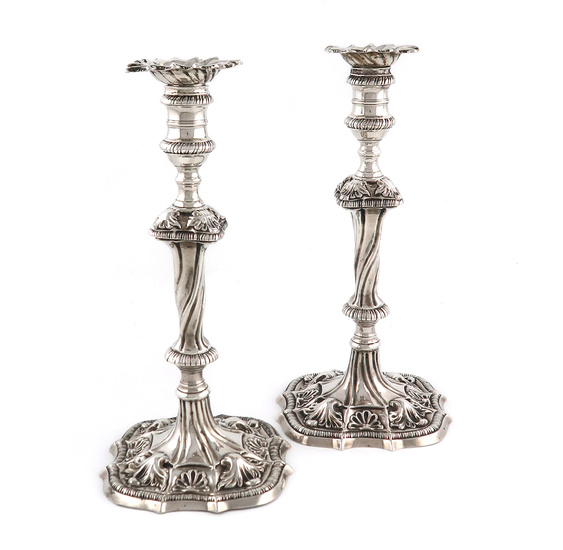 A pair of George III silver candlesticks