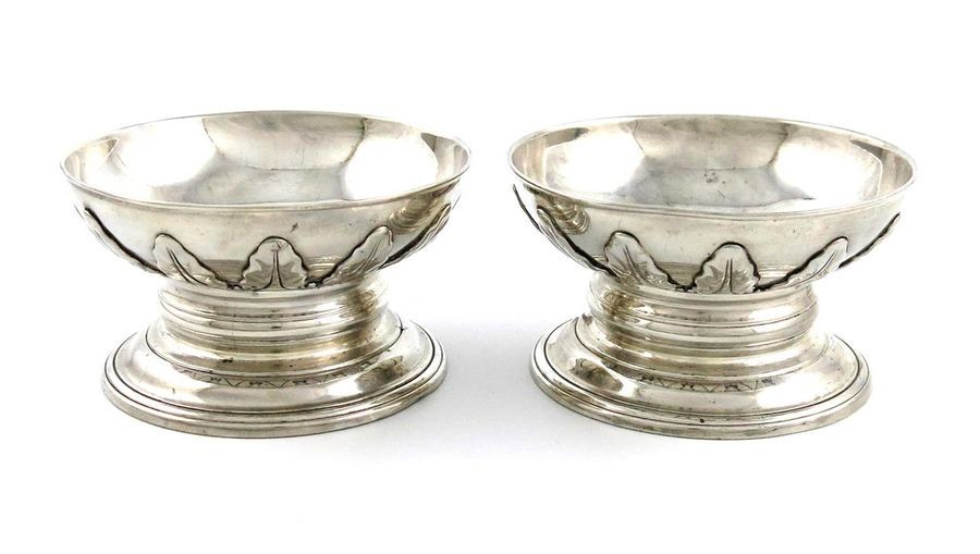 A pair of George III silver salt cellars,...