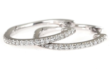 A pair of diamond ear pendants each set with numerous brilliant-cut diamonds...