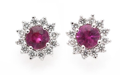 SOLD. A pair of ruby and diamond ear studs each set with a ruby encircled by numerous diamonds, mounted in 18k white gold. (2) – Bruun Rasmussen Auctioneers of Fine Art