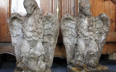 A pair of statues / gate finials modelled as eagles