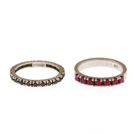 A sapphire and a ruby eternity ring respectively set with numerous circular-cut sapphires and rubies. Size 52. (2)