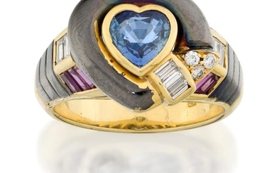 A sapphire, diamond and ruby ring, the central collet-set heart-shaped sapphire with baguette-cut diamond and calibre ruby shoulders, and brilliant-cut diamond three stone terminal, in two-colour mount, stamped 750, approx. ring size T