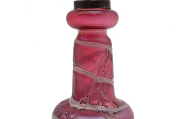 A silver rimmed Loetz style vase in pink glass