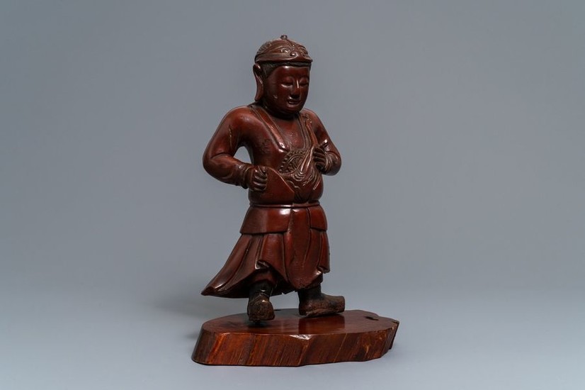 A tall Chinese lacquered wood figure of a...