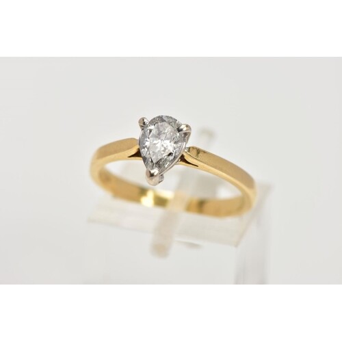 AN 18CT GOLD SINGLE STONE DIAMOND RING, designed with a thre...