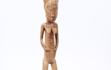 African tribal carved female fertility statue, possibly Dogon Bombou-Toro, Mali. 23"H x 4 1/2"W