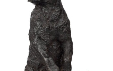 After Eugene Lanceray, Russian, 1875-1946, mid-20th century, a cast iron model of a standing bear, on a naturalistic hexagonal base cast with two tree trunks, 56cm high