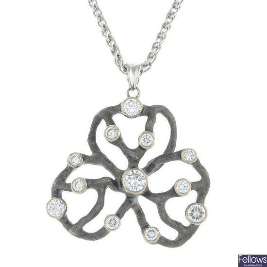 An 18ct gold brilliant-cut diamond stylised clover pendant, with chain.