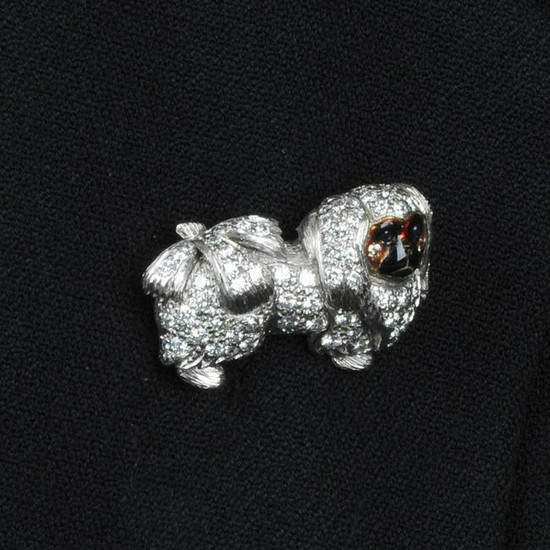 An 18ct gold diamond Pekingese dog brooch, with
