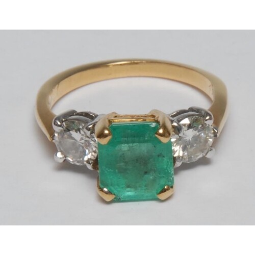An 18ct gold diamond and Columbian emerald ring, emerald 1.5...