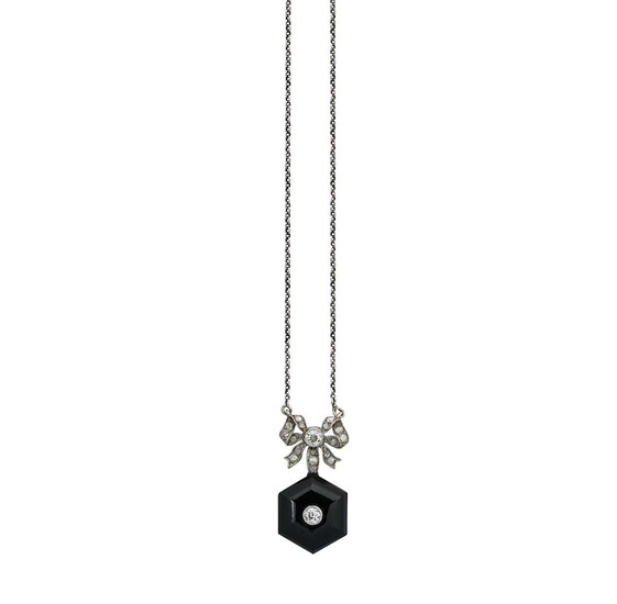 An Art Deco onyx and diamond pendant and chain