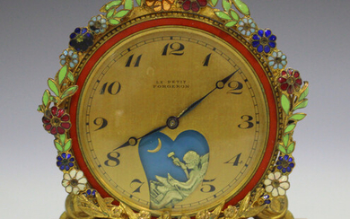An early 20th century gilt metal and enamelled boudoir timepiece, the case back with stamped 'D