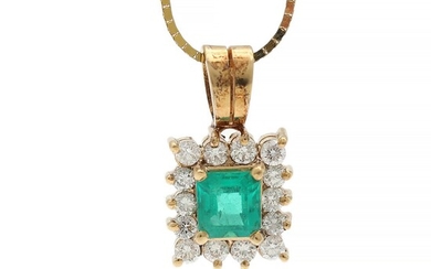 NOT SOLD. An emerald and diamond pendant set with an emerald encircled by numerous diamonds,...