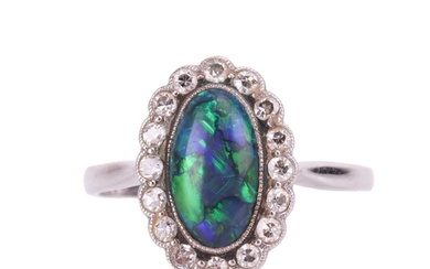 An opal doublet and diamond cluster dress ring, the oval cab...