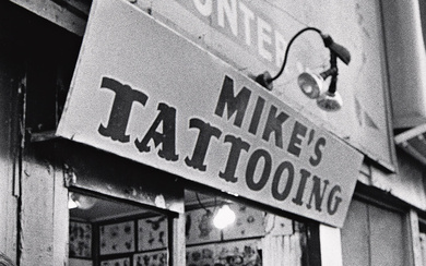 BRUCE DAVIDSON (1933- ) Mike's tattooing, from the series Brooklyn Gang. Silver print,...