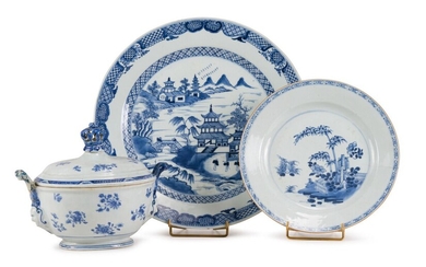 CHINA, India Company - QIANLONG period (1736 - 1795)Set of blue-white porcelain including a dish, a large plate, and a terrine with handles in the form of masks with Indian headdresses, decorated with flowering branches, bamboo, characters in front...
