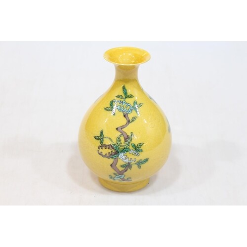 Chinese yellow glazed vase decorated with fruit on dragon in...