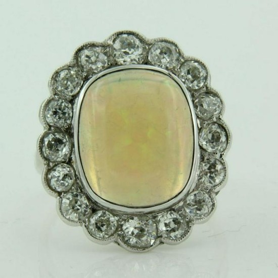 Diamond ring with opal