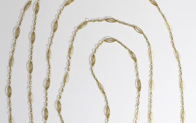 Grande chaîne giletière formant collier double en or (750°°°- poinçon : Aigle) à mailles type...