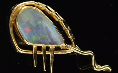 "JADE MORAN" 14K gold and opal Moderne design pendant.