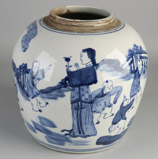 Large blue and white ginger jar with surrounding