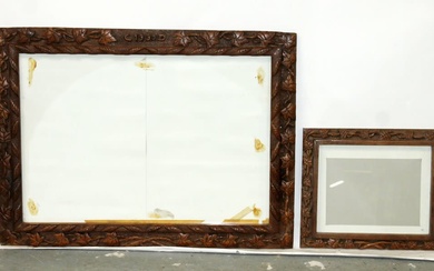 Lot of 2 Swiss Black Forest carved walnut frames with...