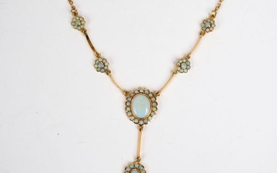Necklace in yellow gold and opals, decorated with six flowers,...