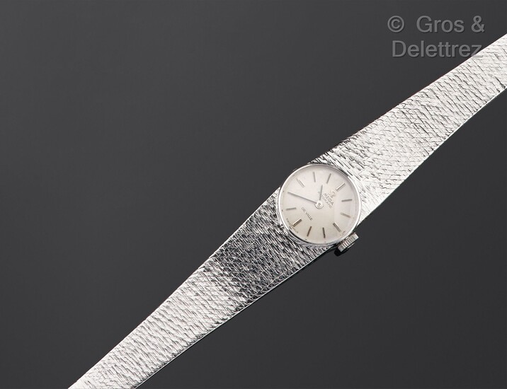 OMEGA - Bracelet-montre de dame en or gris,... - Lot 293 - Gros & Delettrez