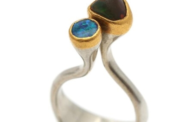 SOLD. Ole W. Jacobsen: An opal ring set with two cabochon, mounted in 18k white gold and 21.6k gold. Size app. 51. – Bruun Rasmussen Auctioneers of Fine Art